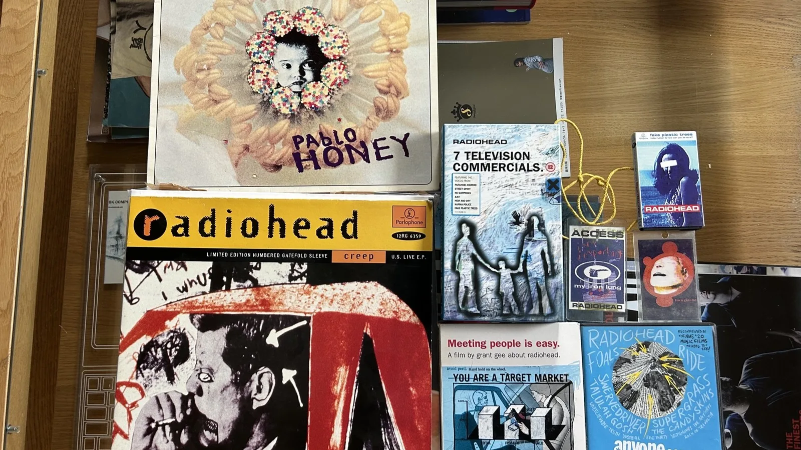 Radiohead records, tapes and passes photographed by the Museum of Oxford for its Sounds of the City exhibition